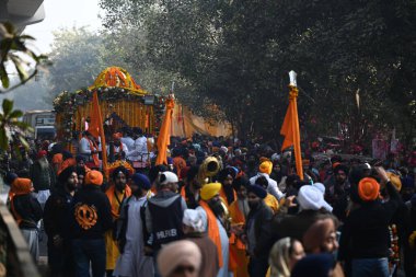 NEW DELHI INDIA JANUARY 14 2024 People participated in the Grand Nagar Kirtan Procession for Guru Gobind Singhs birth anniversary at Patel Nagar the procession started from Gurudwara Rakab Gunj Photo by Salman Ali Hindustan Times clipart