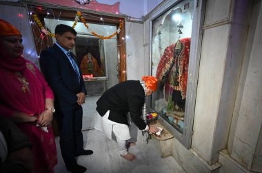 NEW DELHI INDIA JANUARY 14 2024 BJP National President J P Nadda cleans a temple to launch a week long Swachhata Drive on the occasion of Pran Pratishtha of Ram Lala at Guru Ravidas Mandir clipart