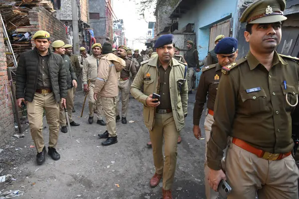 stock image NOIDA INDIA JANUARY 14 2024 Noida Police conducting search operation in slum area before the establishment day of Ram temple on 22nd January in Sector 17 Police sources said that ahead of the Ram Mandir inauguration 10000 Uttar Pradesh Police personn