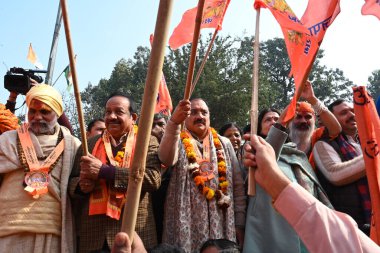 NEW DELHI INDIA JANUARY 17 2024 Delhi BJP President Virendra Sachdeva along with Union Minister Meenakshi Lekhi Chandhi chowk MP harshvardhan and other Sadhu flag off Shri Ram bike rally Mandir Pujari Utsav at Pt Pant Marg Photo by Sonu Mehta Hindust clipart