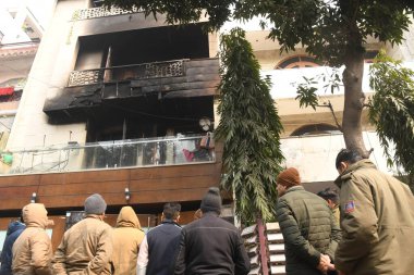 NEW DELHI INDIA JANUARY 19 2024 A view of the multi storey building where a fire broke out on Thursday night at Pitampura area Six people were charred to death and one was injured in a fire which broke out in a multi storey residential building in De clipart