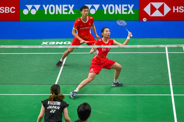 NEW DELHI INDIA JANUARY 18 Ocak 2024 Jiang Zhen Bang Çinli Wei Ya Xin ile Japon Misaki Matsutomo ile yapılan karma çiftler maçında Sanchit Khanna Hind tarafından yapılan Yonex Sunrise India Open 2024 badminton turnuvasında mücadele etmiştir.