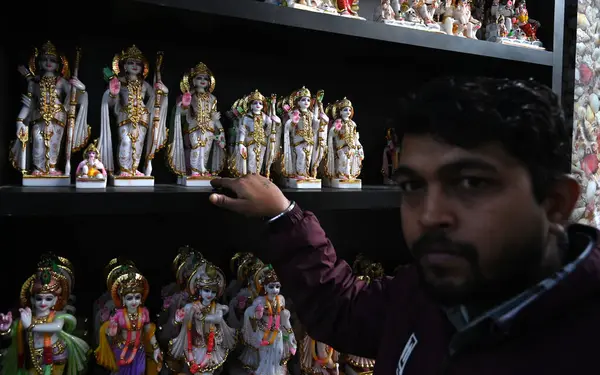 stock image NEW DELHI INDIA JANUARY 19 2024 Idols of Lord Ram Sita and Laxman Gods for sale at a Shop in Qutab road Sale of Ram Darbar Murtis have gone up ahead of consecration ceremony of Shri Ram Lalla Idol at Ayodhya Temple The consecration ceremony is to be 