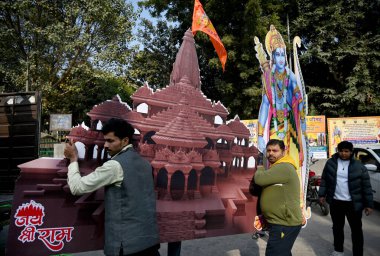 NOIDA INDIA JANUARY 21 2024 Member of Sanatan Dharam Mandir installing cutout of Ram Mandir for the worship of Lord Ram at Sector 19 Sanatan Dharam Mandir yesterday Photo by Sunil Ghosh Hindustan Times  clipart