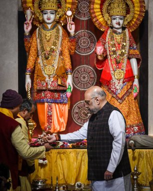 NEW DELHI INDIA JANUARY 22 2024 Union Home Minister Amit Shah offers prayers at Laxmi Narayan Temple Birla Mandir ahead of the consecration ceremony of Ayodhya Ram Mandir Photo by Raj K Raj Hindustan Times  clipart