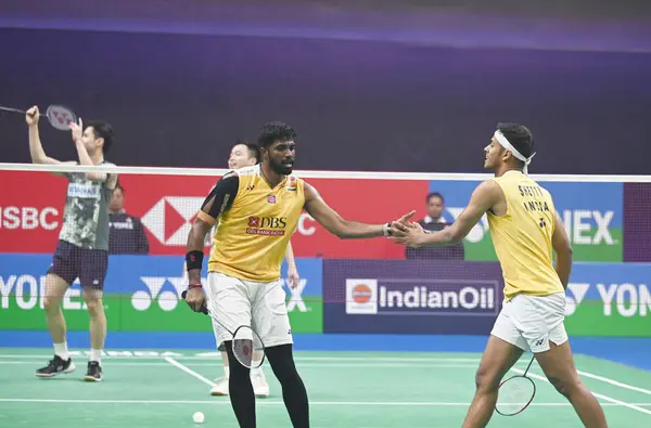 stock image NEW DELHI INDIA JANUARY 20 2024 Satwiksairaj Rankireddy with Chirag Shetty from India competes during the Mens doubles match against Aaron Chia with Soh Wooi Yik from Malaysia at Semi Final Match of the Yonex Sunrise India Open 2024 Badminton Tournam