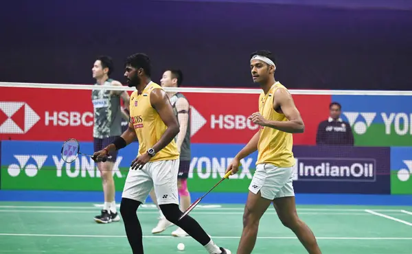 stock image NEW DELHI INDIA JANUARY 20 2024 Satwiksairaj Rankireddy with Chirag Shetty from India competes during the Mens doubles match against Aaron Chia with Soh Wooi Yik from Malaysia at Semi Final Match of the Yonex Sunrise India Open 2024 Badminton Tournam