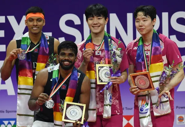 stock image NEW DELHI INDIA JANUARY 21 2024 Reigning World Champions Kang Min Hyuk and Seo Seung Jae from Korea at podium after winning the Men Double Final against India Satwiksairaj Ranireddy and Chirag Shetty in Yonex Sunrise India Open 2024 at IGI Stadium Ph