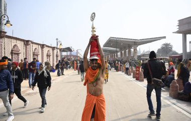 AYODHYA INDIA JANUARY 23 2024 A dovotee going for Darshan to Ram Mandir Devotees are celebrating the consecration ceremony all over the world with joy and fanfare The Ramjanmbhoomi temple in Ayodhya was built after a long battle in the courts and the clipart