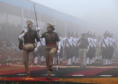 GREATER NOIDA INDIA JANUARY 26 2024 Uttar Pradesh Police personnel march during the 75th Republic Day Parade at Surajpur police line on January 26 2024 in Greater Noida India India gears up for its platinum celebration of the country Republic Day on  clipart