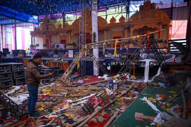 NEW DELHI INDIA JANUARY 28 2024 A view of the spot where a wooden platform collapsed during a Jagran last night reportedly at Kalkaji Temple In a tragic incident one woman was killed and 17 others were injured after a platform made of wood and iron f clipart