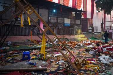 NEW DELHI INDIA JANUARY 28 2024 A view of the spot where a wooden platform collapsed during a Jagran last night reportedly at Kalkaji Temple In a tragic incident one woman was killed and 17 others were injured after a platform made of wood and iron f clipart