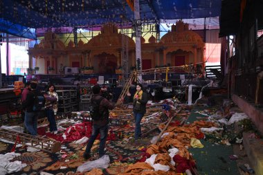 NEW DELHI INDIA JANUARY 28 2024 A view of the spot where a wooden platform collapsed during a Jagran last night reportedly at Kalkaji Temple In a tragic incident one woman was killed and 17 others were injured after a platform made of wood and iron f clipart