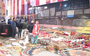 NEW DELHI INDIA JANUARY 28 2024 A view of the spot where a wooden platform collapsed during a Jagran last night reportedly at Kalkaji Temple In a tragic incident one woman was killed and 17 others were injured after a platform made of wood and iron f clipart