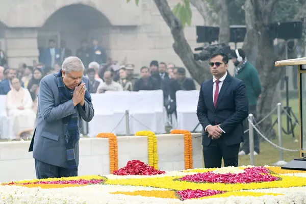 stock image NEW DELHI INDIA JANUARY 30 2024 Vice President of India Jagdeep Dhankhar pays homage to Mahatma Gandhi on Martyrs Day observed to mark the death anniversary of the father of the nation at Rajghat Photo by Ajay Aggarwal Hindustan Times 