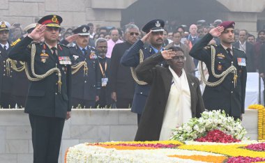 NEW DELHI INDIA JANUARY 30 2024 President Droupadi Murmu pays homage to Mahatma Gandhi on Martyrs Day observed to mark the death anniversary of the father of the nation at Rajghat Photo by Sonu Mehta Hindustan Times  clipart