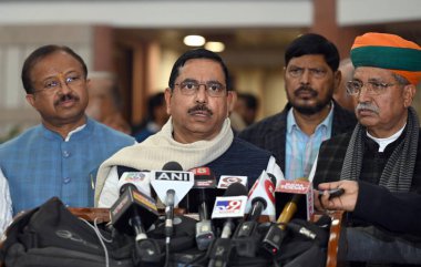 NEW DELHI INDIA JANUARY 30 2024 Union Parliamentary Affairs Minister Pralhad Joshi speaks to the media after the all party meeting ahead of the interim Budget Session of Parliament as Union Ministers of State Arjun Ram Meghwal and V Muraleedharan loo clipart