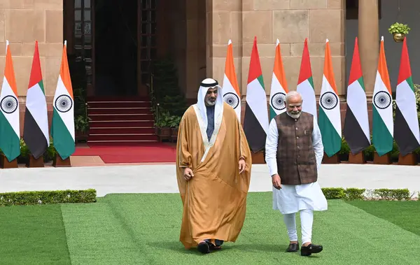 stock image NEW DELHI, INDIA - SEPTEMBER 9: Prime Minister Narendra Modi welcomes Abu Dhabi's Crown Prince Sheikh Khaled Bin Mohammed Bin Zayed Al Nahyan upon his arrival at Hyderabad House, on September 9, 2024 in New Delhi, India. 