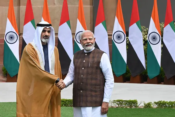 stock image NEW DELHI, INDIA - SEPTEMBER 9: Prime Minister Narendra Modi welcomes Abu Dhabi's Crown Prince Sheikh Khaled Bin Mohammed Bin Zayed Al Nahyan upon his arrival at Hyderabad House, on September 9, 2024 in New Delhi, India. 