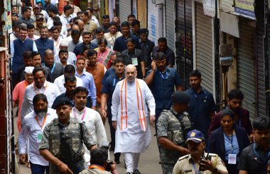 MUMBAI INDIA SEPTEMBER 9 2024 Union Home Minister Amit Shah along with Maharashtra CM Eknath Shinde and Maharashtra Dy CM Devendra Fadanvis return after offering prayer at Lalbaugcha Raja during the Ganesh Festival on September 9 2024 in Mumbai India clipart