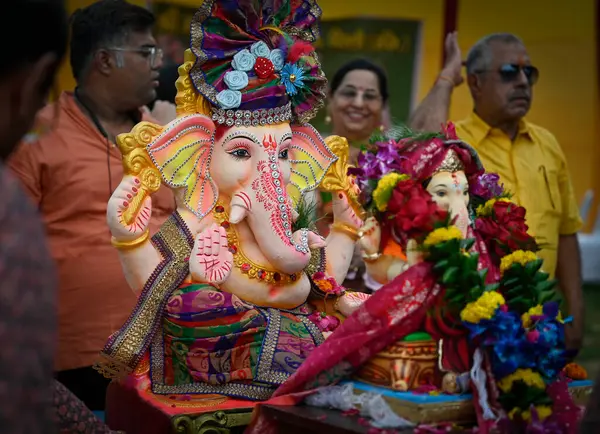 stock image NEW DELHI INDIA SEPTEMBER 7 2024 Devotees carry Lord Ganesha idols on the occasion of Ganesh Chaturthi in Lovely Public Senior Secondary School Laxmi Nagar on September 7 2024 in New Delhi India Ganesh Chaturthi is celebrated across the country to ma