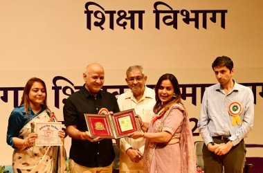 NEW DELHI INDIA SEPTEMBER 5 2024 AAP Leader and former Delhi Deputy CM Manish Sisodia facilitates meritorious teachers from MCD Schools on the occasion of Teachers Day at Kedarnath Sahni Auditorium at Civic Center on September 5 2024 in New Delhi Ind clipart