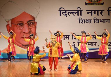 NEW DELHI INDIA SEPTEMBER 5 2024 MCD School Teacher performing cultural Progammme during the Shikshak Samman Samaroh organized by the MCD Education Department at Civic Centre At Kedarnath Sahni Auditorium Civic Centre on September 5 2024 in New Delhi clipart