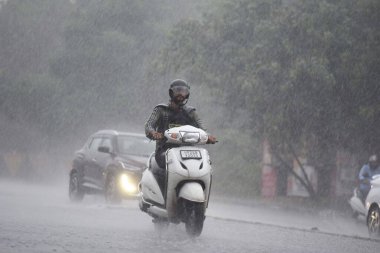 GURUGRAM INDIA SEPTEMBER 4 2024 Commuter travel on the Sohna Elevated Expressway amid heavy rains near Air Force Station on September 4 2024 in Gurugram India Delhi NCR residents witnessed a sudden change in weather as heavy rain lashed several parts clipart