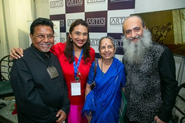 NEW DELHI INDIA AUGUST 30 2024 Payal Kapoor Artists Shobha Broota and Sanjay Bhattacharya during an art fair Artix 30 a hotel based art fair where the rooms of a premier Delhi hotel were transformed into intimate preview spaces at The Claridges Hotel clipart