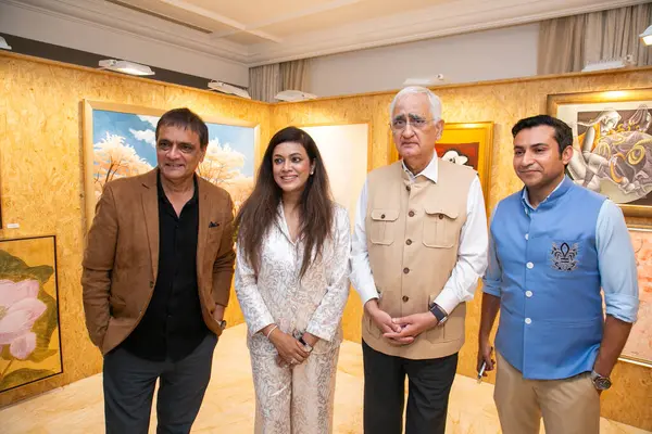 stock image NEW DELHI INDIA AUGUST 30 2024 Congress leader Salman Khurshid 2R during an art fair Artix 30 a hotel based art fair where the rooms of a premier Delhi hotel were transformed into intimate preview spaces at The Claridges Hotel on August 30 2024 in Ne