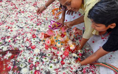 NEW DELHI INDIA SEPTEMBER 11 2024 Devotees celebrating during the immersion ceremony of the idol of Lord Ganesha at Bank Enclave on September 11 2024 in New Delhi India Photo by Sanjeev Verma Hindustan Times clipart