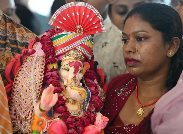 stock image NEW DELHI INDIA SEPTEMBER 11 2024 Devotees celebrating during the immersion ceremony of the idol of Lord Ganesha at Bank Enclave on September 11 2024 in New Delhi India Photo by Sanjeev Verma Hindustan Times