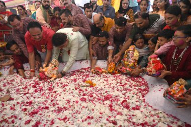 NEW DELHI INDIA SEPTEMBER 11 2024 Devotees seen immersing Idols of Hindu Lord Ganesh five day s at Delhi ka Maharaja go for ecofriendly Ganpati Visarjan during the 23rd Ganesh Mahotsav 2024 at Laxmi Nagar on September 11 2024 in New Delhi India The i clipart