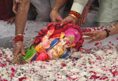 NEW DELHI INDIA SEPTEMBER 11 2024 Devotees seen immersing Idols of Hindu Lord Ganesh five day s at Delhi ka Maharaja go for ecofriendly Ganpati Visarjan during the 23rd Ganesh Mahotsav 2024 at Laxmi Nagar on September 11 2024 in New Delhi India The i clipart