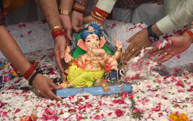 NEW DELHI INDIA SEPTEMBER 11 2024 Devotees seen immersing Idols of Hindu Lord Ganesh five day s at Delhi ka Maharaja go for ecofriendly Ganpati Visarjan during the 23rd Ganesh Mahotsav 2024 at Laxmi Nagar on September 11 2024 in New Delhi India The i clipart