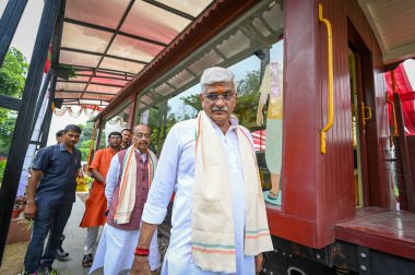 NEW DELHI INDIA SEPTEMBER 11 2024 Gajendra Singh Shekhawat Union Minister of Culture and Tourism along with BJP leader Vijay Goel inaugurates the Railway coach dedicated to the father of nation Mahatma Gandhi at Gandhi Darshan on September 11 2024 in clipart