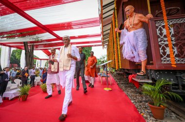 NEW DELHI INDIA SEPTEMBER 11 2024 Gajendra Singh Shekhawat Union Minister of Culture and Tourism along with BJP leader Vijay Goel inaugurates the Railway coach dedicated to the father of nation Mahatma Gandhi at Gandhi Darshan on September 11 2024 in clipart