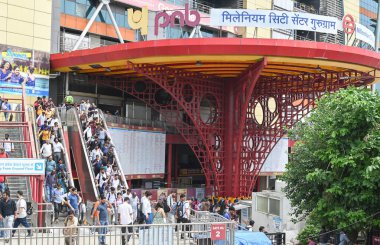 GURUGRAM INDIA JULY 6 2023 The Delhi Metro Rail Corporation DMRC installed the renamed board at HUDA City Center station on the Delhi Metro Yellow Line which has been renamed as Millennium City Center Gurugram on July 6 2023 in Gurugram India Photo b clipart