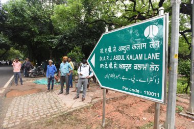 NEW DELHI INDIA JULY 6 2023 NDMC workers unveil a signboard bearing Dr APJ Abdul Kalam Lane following the renaming of the Aurangzeb Road after the former president on July 6 2023 in New Delhi India Photo by Sonu Mehta Hindustan Times clipart