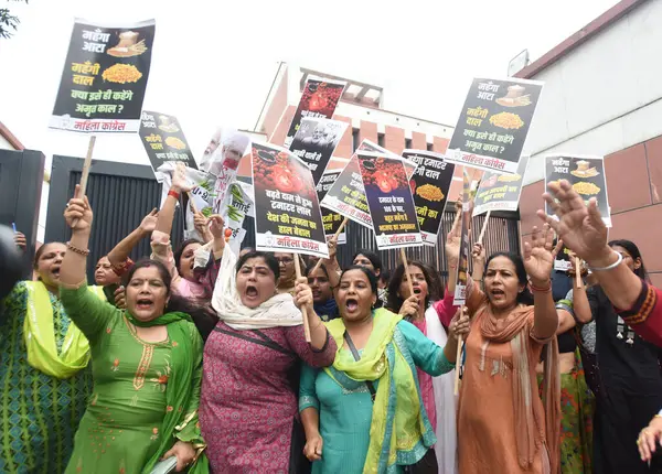 stock image NEW DELHI INDIA JULY 4 2023 Mahila Congress Flash protest against rising prices in food products at BJP HQ DDU Marg on July 4 2023 in New Delhi India Photo by Sonu Mehta Hindustan Times