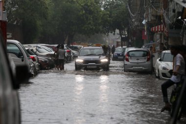 NEW DELHI INDIA JULY 8 2023 After heavy monsoon rainfall waterlogged at Shaheen Bagh on July 8 2023 in New Delhi India Delhi NCR was drenched with heavy rain on the intervening night of Friday and Saturday The overnight shower which continued on Satu clipart