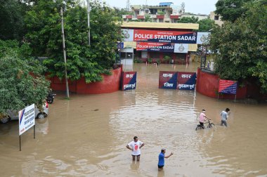 GURUGRAM INDIA JULY 9 2023 A view of a water logged stretch after heavy monsoon rains near Sadar Police Station at Subhash Chowk on July 9 2023 in Gurugram India Delhi NCR was drenched with heavy rain on the intervening night of Friday Saturday and S clipart