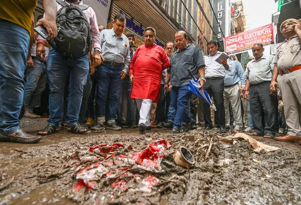 stock image NEW DELHI INDIA - SEPTEMBER 12:  Praveen Khandelwal Member of Parliament from BJP inspects the streets of Chandni Chowk  on September 12 ,2024 in New Delhi, India 