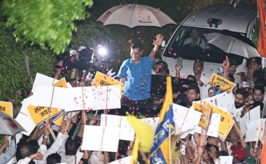 NEW DELHI INDIA SEPTEMBER 13 2024 Delhi Chief Minister and Aam Aadmi Party National Convener Arvind Kejriwal waves to the party workers during the Road Show after being released from Tihar Jail as the Supreme Court granted him bail in a corruption ca clipart