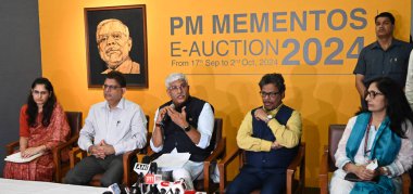 NEW DELHI INDIA SEPTEMBER 16 2024 Minister of Tourism Culture and Development of North Eastern Region of India Gajendra Singh Shekhawat and others address the media persons during the inauguration of exhibition of mementos presented to Prime Minister clipart