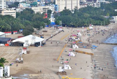 MUMBAI INDIA SEPTEMBER 16 2024 Heavy police security deployed at Girgaon Chowpatty to prepare alerts during lacs people gathered to witness the Ganpati Immersion on September 16 ,2024 in Mumbai India clipart