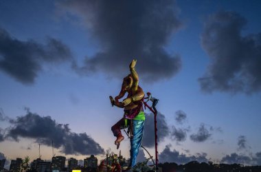 MUMBAI INDIA SEPTEMBER 17 2024 the ceremonies for immersion of ganesh idols progressed peacefully where lakhs of devotees come out on the streets to bid adieu to ganpati at Girgaon chowpatty on September 17, 2024 in Mumbai, India  clipart