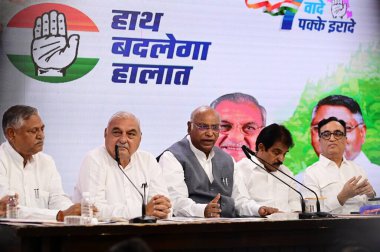 NEW DELHIINDIA SEPTEMBER 18 2024 Guarantees for Haryana released by Congress president Mallikarjun Kharge in the presence of KC Venugopal and Bhupinder Singh Hooda on September 18 2024 in New Delhi India. Photo by Vipin Kumar Hindustan Times clipart