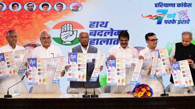 NEW DELHIINDIA SEPTEMBER 18 2024 Guarantees for Haryana released by Congress president Mallikarjun Kharge in the presence of KC Venugopal and Bhupinder Singh Hooda on September 18 2024 in New Delhi India. Photo by Vipin Kumar Hindustan Times clipart