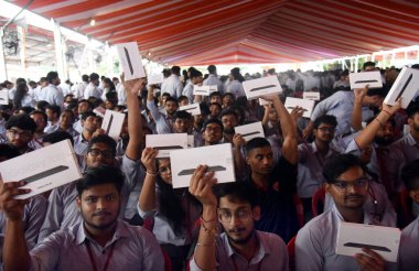 GHAZIABADINDIA SEPTEMBER 18 2024 Students with their tablets distributed by Uttar Pradesh Chief Minister Yogi Adityanath at Ghantaghar Ramlila Maidan on September 18 2024 in Ghaziabad India. Photo by Sakib Ali Hindustan Times clipart